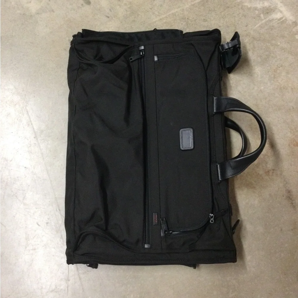 Tumi Black Men's Travel Duffel with Front Zip Pocket and Carry Handles